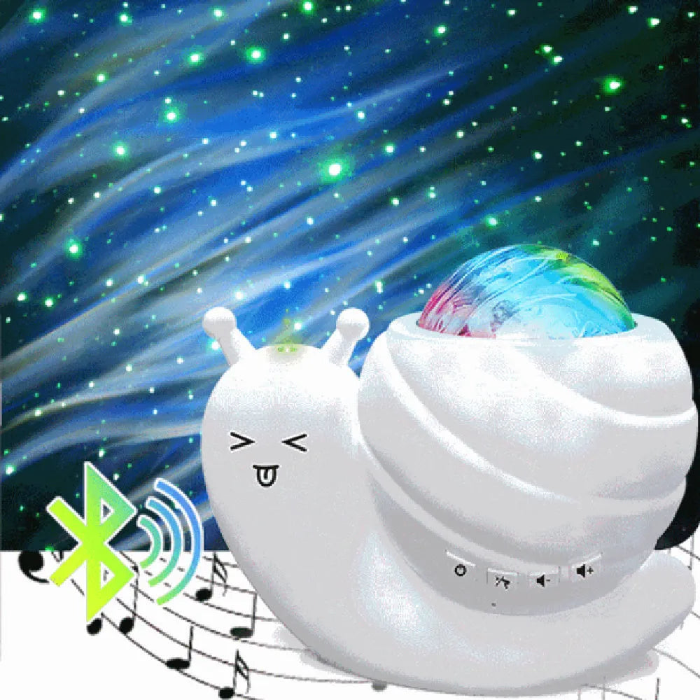 Snail-shaped starry sky projection lamp in blue with remote control on a table