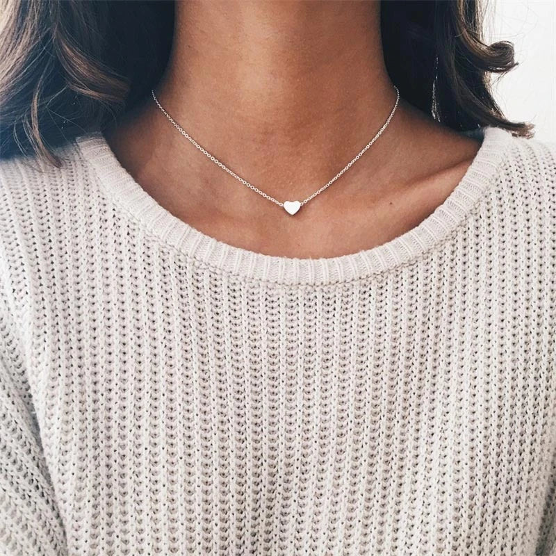 A stylish double-sided love pendant necklace made of premium alloy and featuring a chic geometric design, perfect for elevating any outfit.