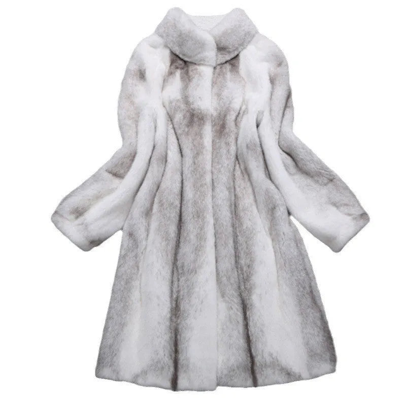 White faux fur women's winter coat with stand-up collar on a hanger