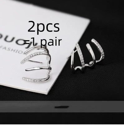 Pair of 925 sterling silver earrings with four-prong zircon stone settings in a geometric design