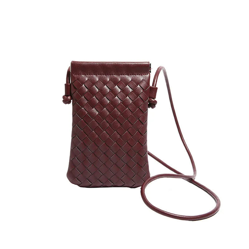 Vintage weave crossbody phone bag in pu leather showing vertical square design and dark cell interior