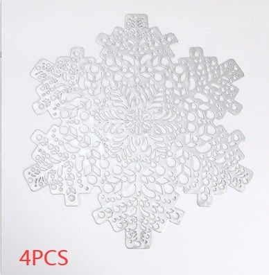 Snowflake-patterned heat-resistant placemats in gold and silver colors, ideal for holiday table settings and decor
