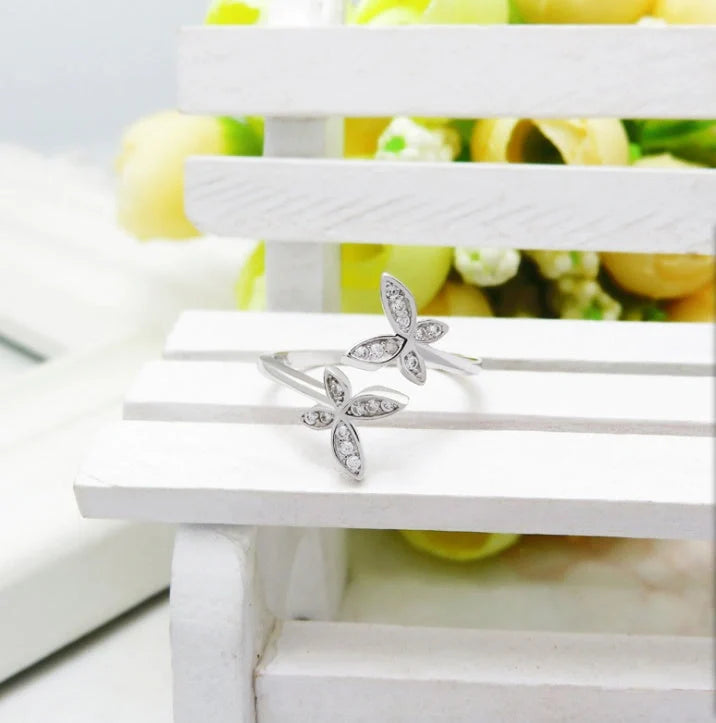 Elegant sterling silver adjustable butterfly ring with gem embellishments