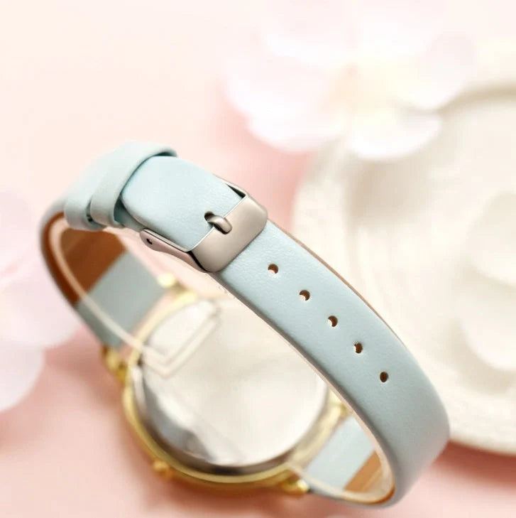 Elegant rose gold women's watch with leather strap and love heart design