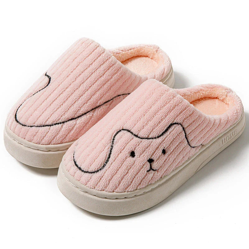 Cozy cat-themed house slippers in various colors with plush fabric and non-slip rubber soles