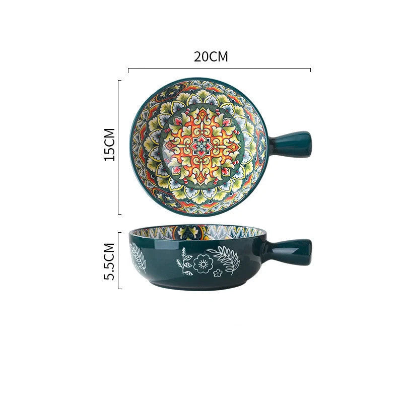 Elegant ceramic bowls with floral handles in blue, red, and green glazed finishes, perfect for serving salads and desserts