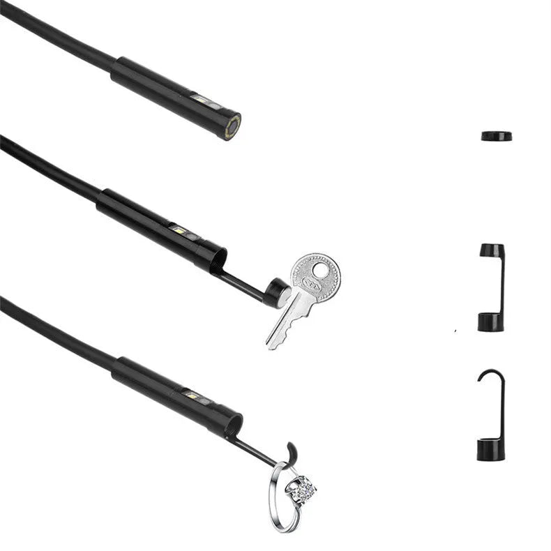 F300 wireless dual lens endoscope with IP68 waterproof probe, magnet, and hook accessories on a table.