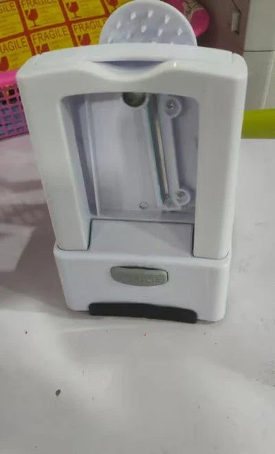 Versatile hand-powered vegetable slicer with interchangeable blades, suction base, and protective hand guard for effortless, safe meal prep