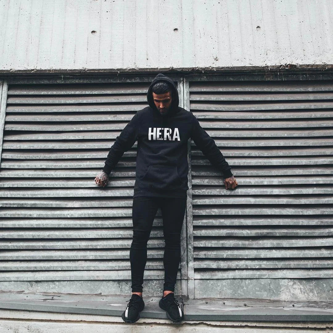 Trendy distressed black skinny jeans for men, featuring a super-elastic cotton construction and edgy, lived-in look