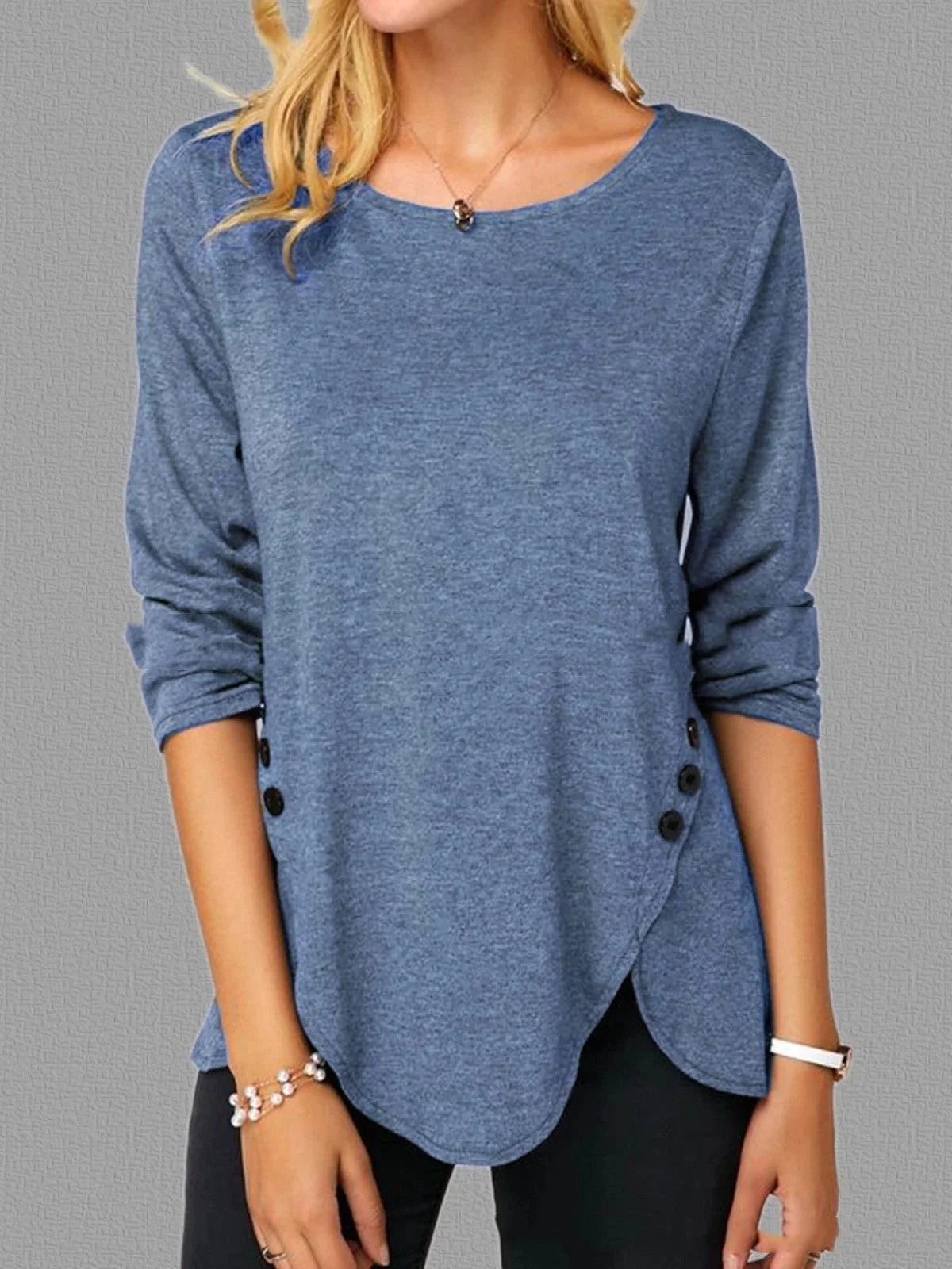 Oversized cotton T-shirt with unique irregular button hem design in various colours