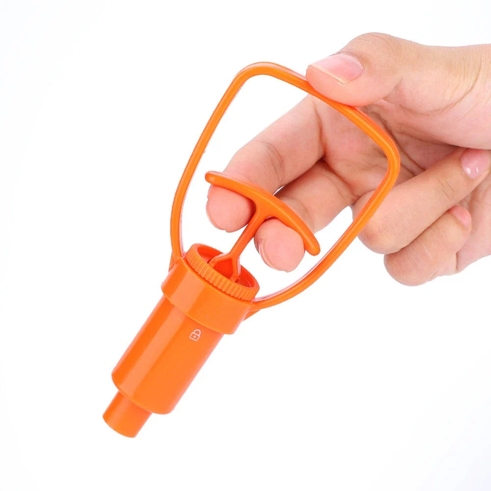 Orange outdoor venom extractor suction pump with first aid accessories for hiking, camping, and wilderness adventures