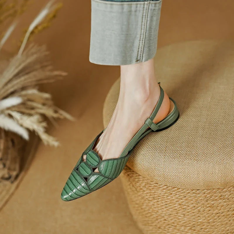 Chic pointed toe slingback sandals in khaki colour, featuring a low square heel and elegant leather design.