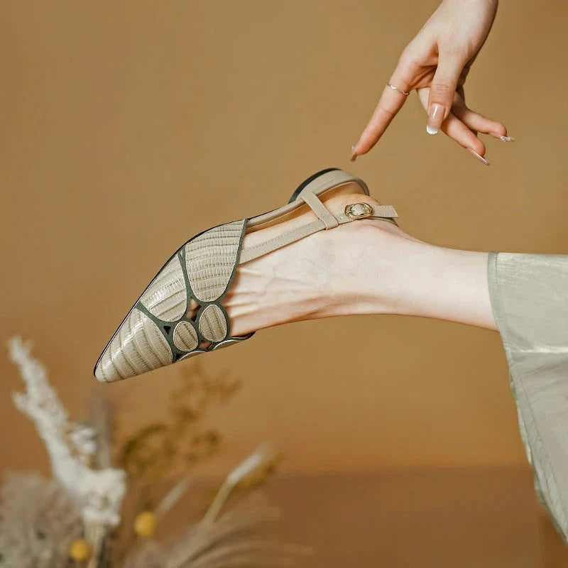 Chic pointed toe slingback sandals in khaki colour, featuring a low square heel and elegant leather design.