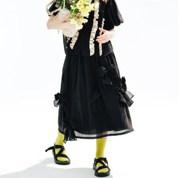 Chic Black Bow A-Line Midi Skirt for women, featuring a flattering A-line silhouette and elegant mid-calf length.