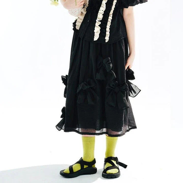 Chic Black Bow A-Line Midi Skirt for women, featuring a flattering A-line silhouette and elegant mid-calf length.