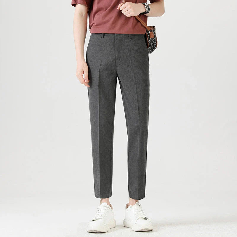 Light Luxury Men's Casual Small Trousers in various colours and sizes, featuring a stretch, pencil-leg design for a tailored, refined look.