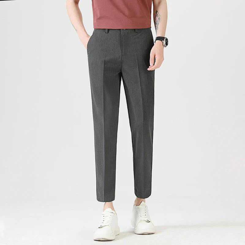 Light Luxury Men's Casual Small Trousers in various colours and sizes, featuring a stretch, pencil-leg design for a tailored, refined look.