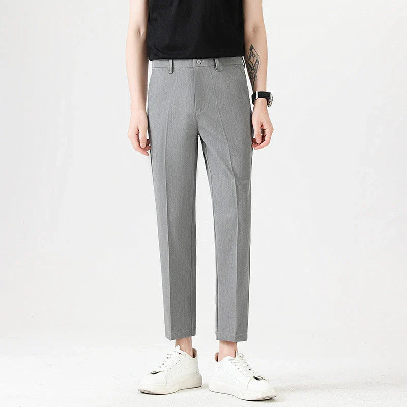 Light Luxury Men's Casual Small Trousers in various colours and sizes, featuring a stretch, pencil-leg design for a tailored, refined look.