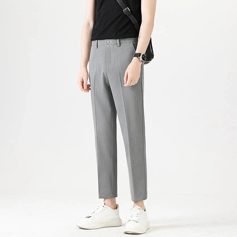 Light Luxury Men's Casual Small Trousers in various colours and sizes, featuring a stretch, pencil-leg design for a tailored, refined look.