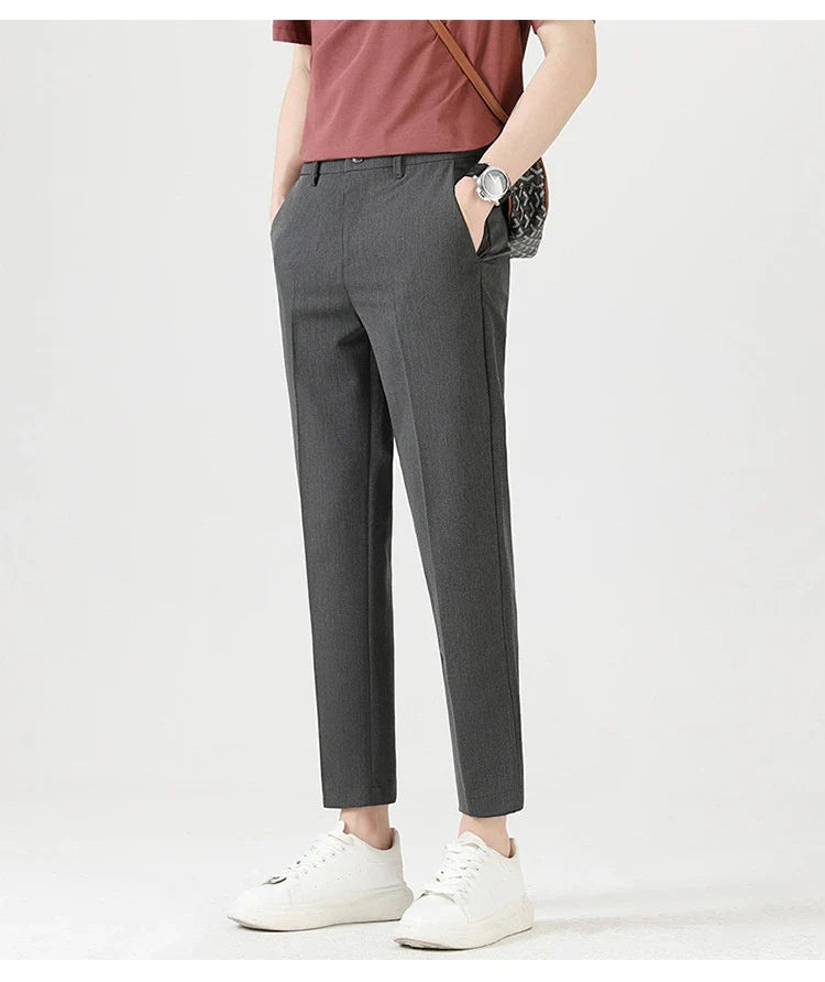 Light Luxury Men's Casual Small Trousers in various colours and sizes, featuring a stretch, pencil-leg design for a tailored, refined look.