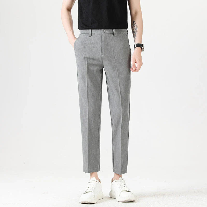 Light Luxury Men's Casual Small Trousers in various colours and sizes, featuring a stretch, pencil-leg design for a tailored, refined look.