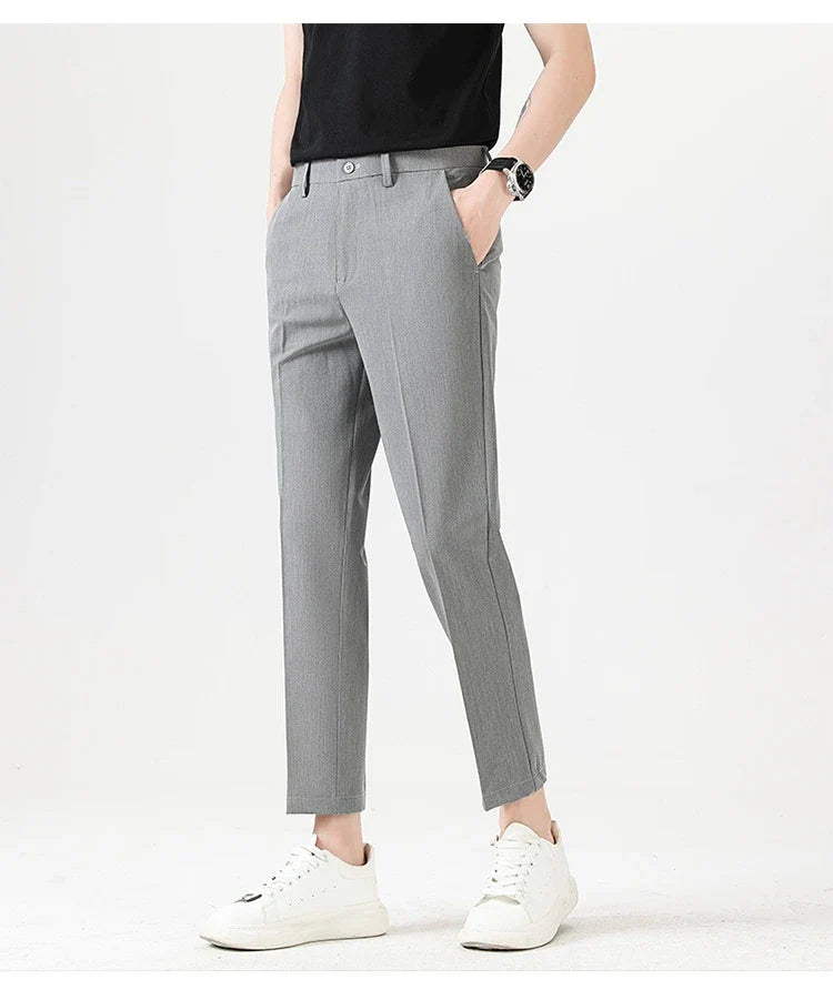 Light Luxury Men's Casual Small Trousers in various colours and sizes, featuring a stretch, pencil-leg design for a tailored, refined look.