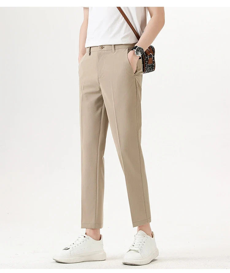 Light Luxury Men's Casual Small Trousers in various colours and sizes, featuring a stretch, pencil-leg design for a tailored, refined look.