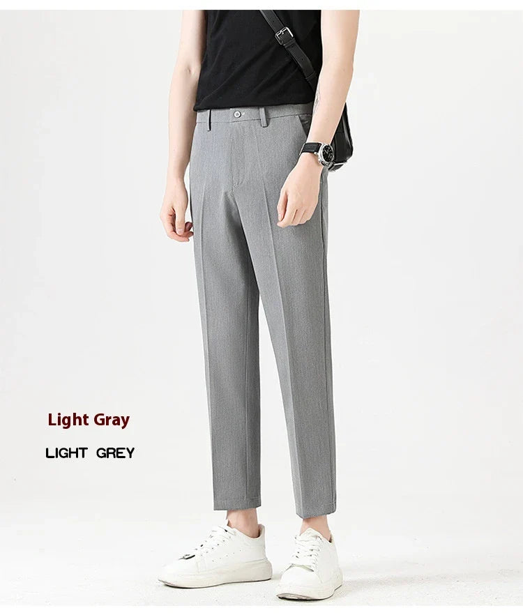 Light Luxury Men's Casual Small Trousers in various colours and sizes, featuring a stretch, pencil-leg design for a tailored, refined look.