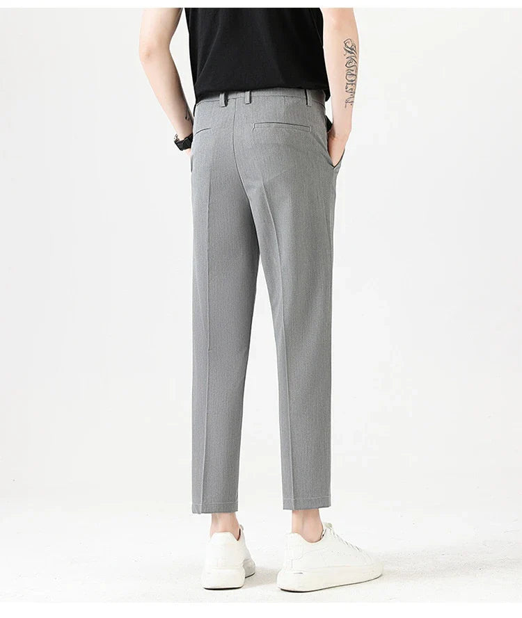 Light Luxury Men's Casual Small Trousers in various colours and sizes, featuring a stretch, pencil-leg design for a tailored, refined look.
