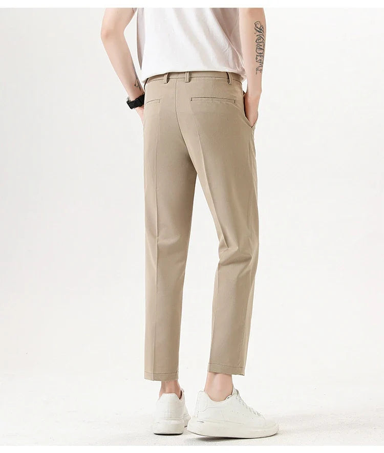 Light Luxury Men's Casual Small Trousers in various colours and sizes, featuring a stretch, pencil-leg design for a tailored, refined look.