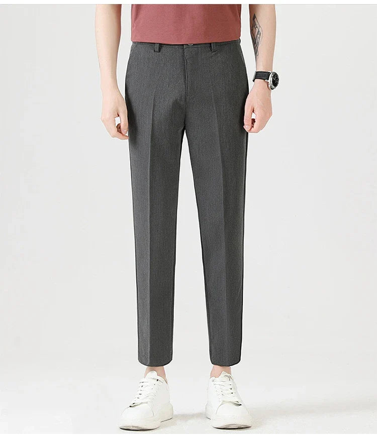 Light Luxury Men's Casual Small Trousers in various colours and sizes, featuring a stretch, pencil-leg design for a tailored, refined look.