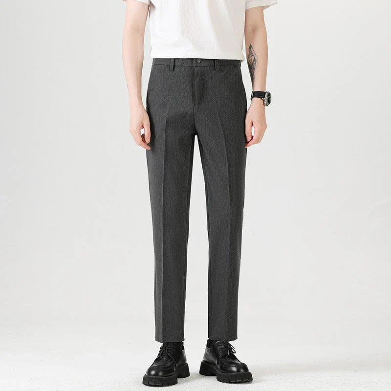 Light Luxury Men's Casual Small Trousers in various colours and sizes, featuring a stretch, pencil-leg design for a tailored, refined look.