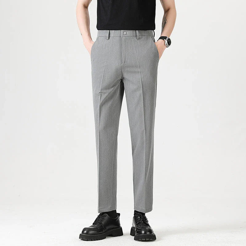 Light Luxury Men's Casual Small Trousers in various colours and sizes, featuring a stretch, pencil-leg design for a tailored, refined look.