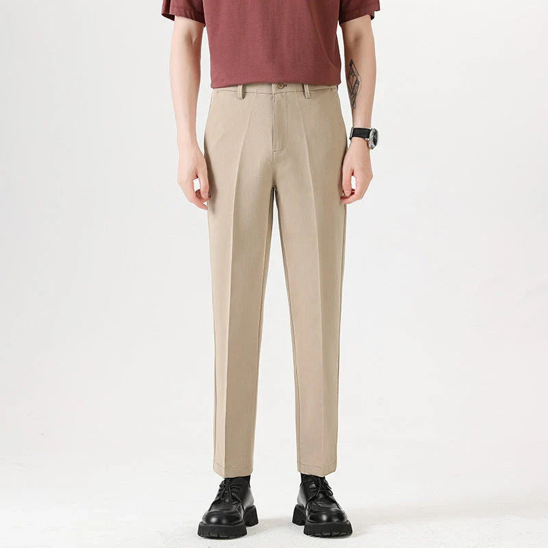 Light Luxury Men's Casual Small Trousers in various colours and sizes, featuring a stretch, pencil-leg design for a tailored, refined look.
