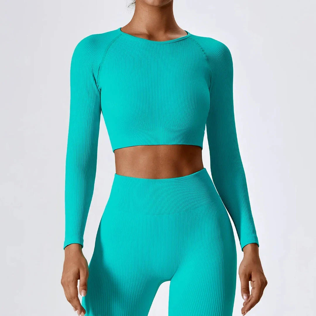 A stylish and comfortable women's ribbed long sleeve yoga crop top in Tiffany Blue colour