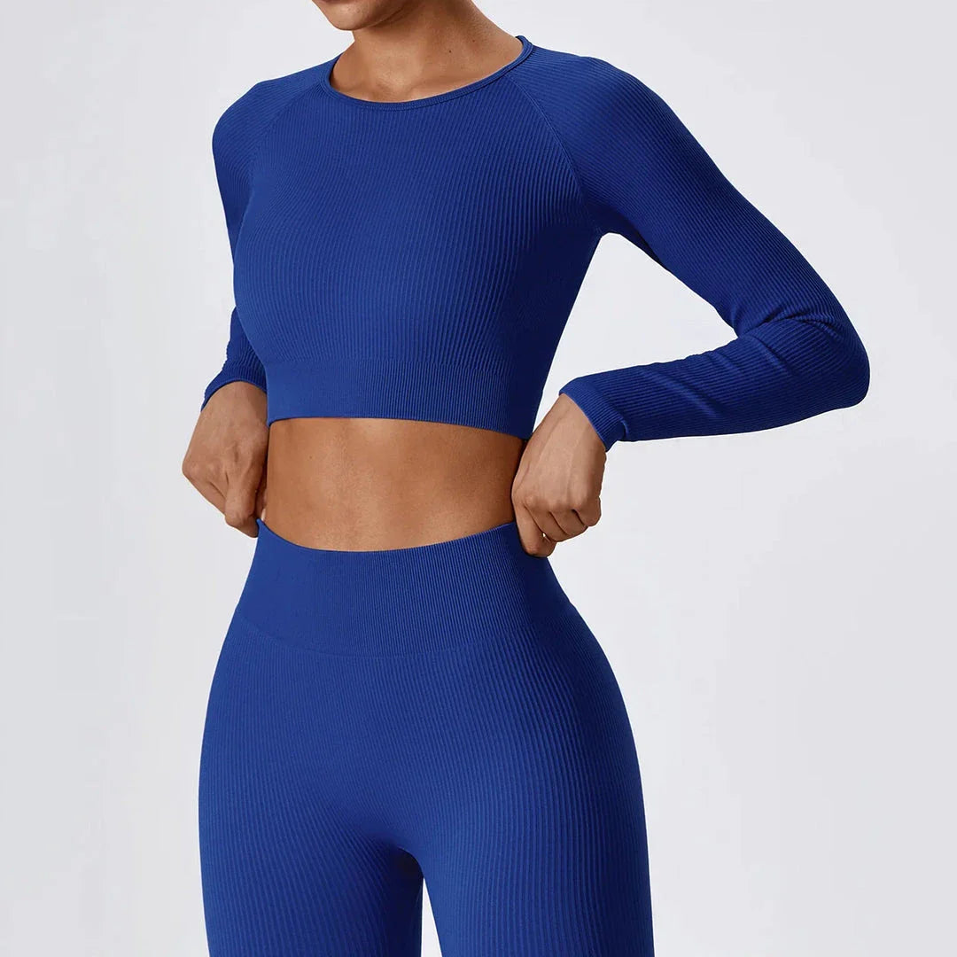 A stylish and comfortable women's ribbed long sleeve yoga crop top in Tiffany Blue colour