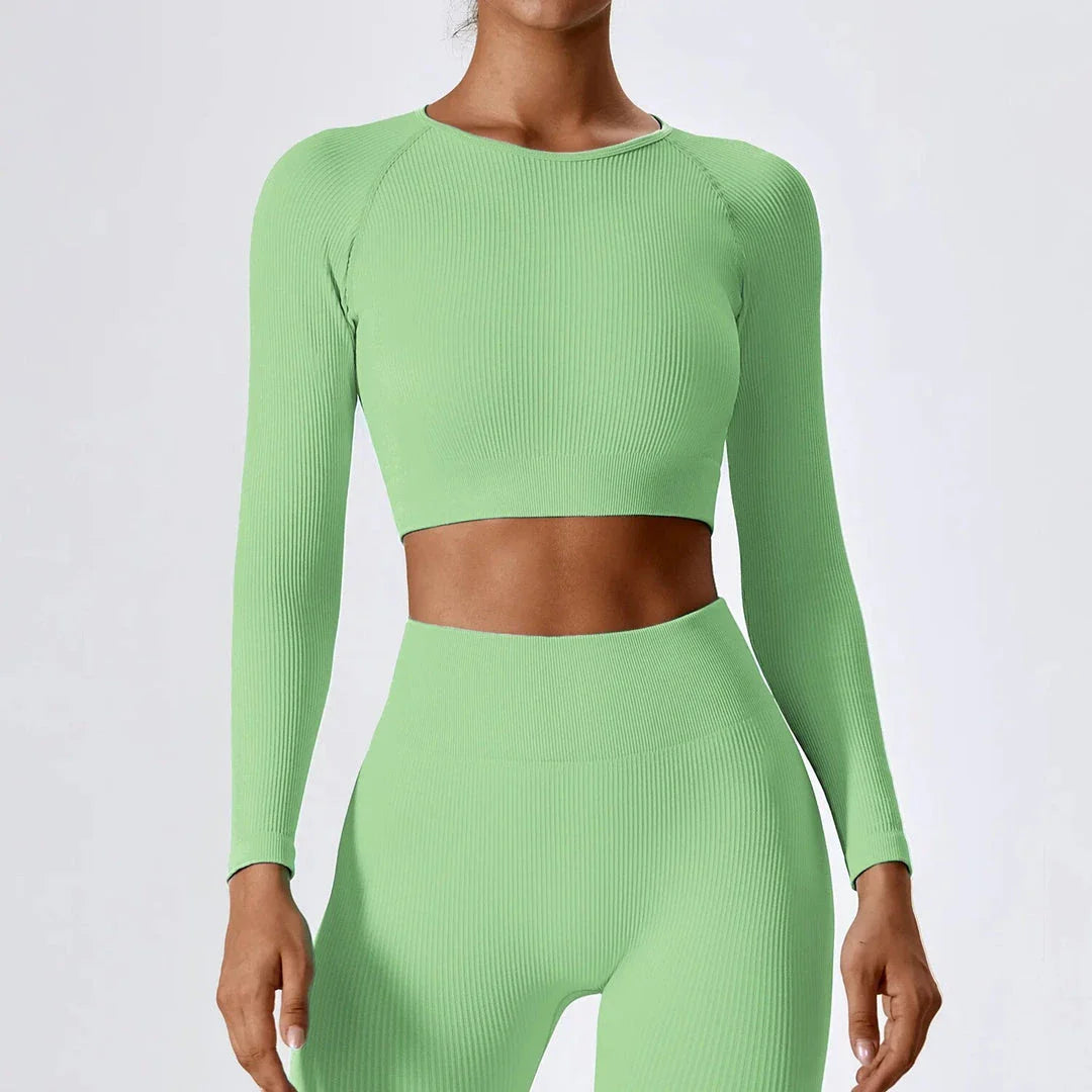 A stylish and comfortable women's ribbed long sleeve yoga crop top in Tiffany Blue colour