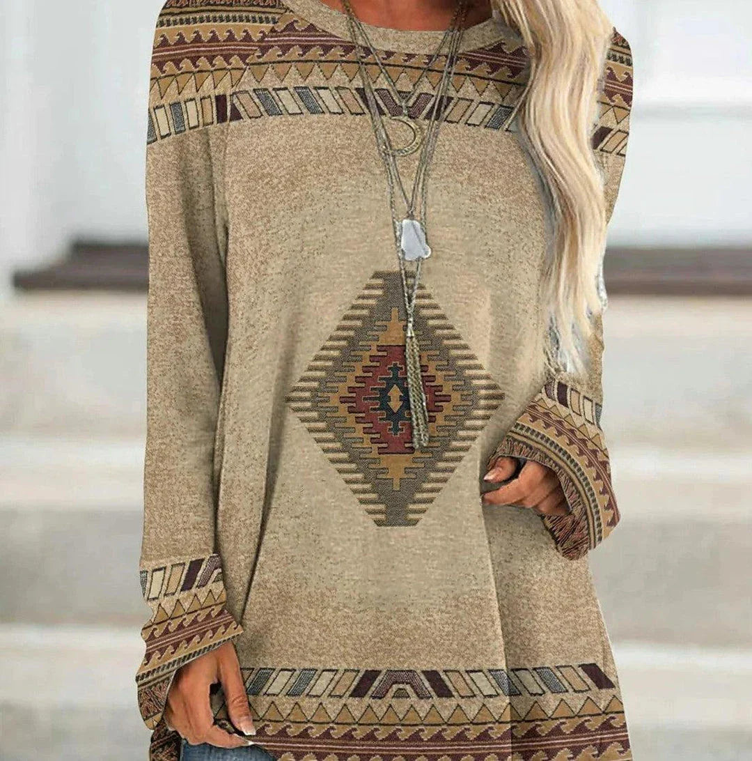 A long t-shirt dress in a retro ethnic style, featuring a round neckline and mid-waist silhouette for a flattering fit.