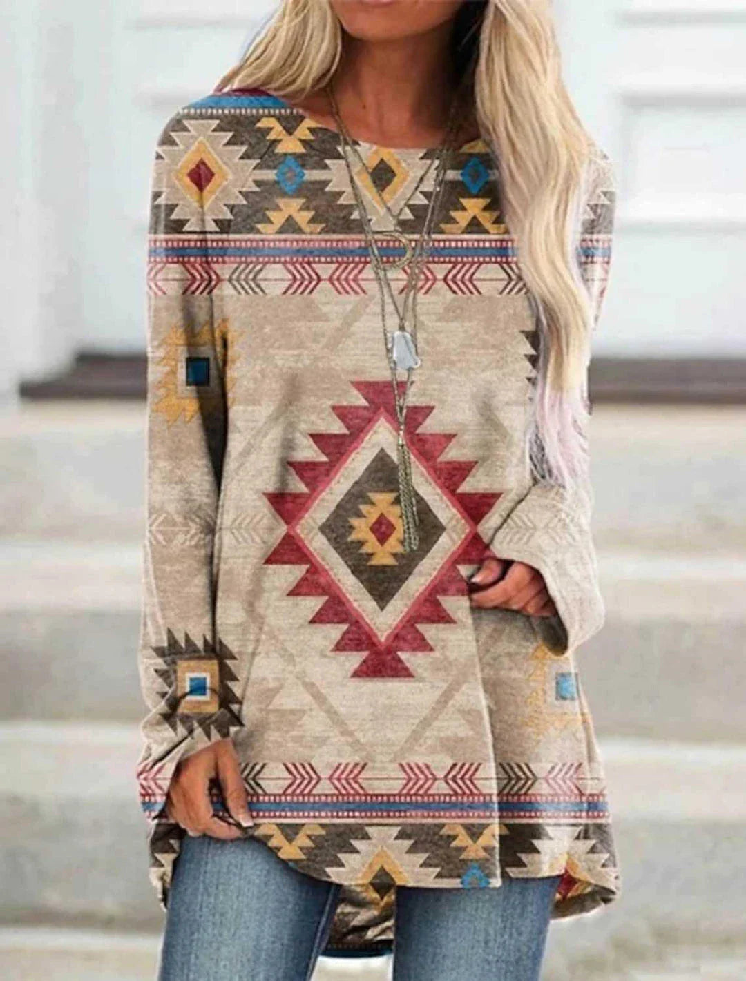 A long t-shirt dress in a retro ethnic style, featuring a round neckline and mid-waist silhouette for a flattering fit.
