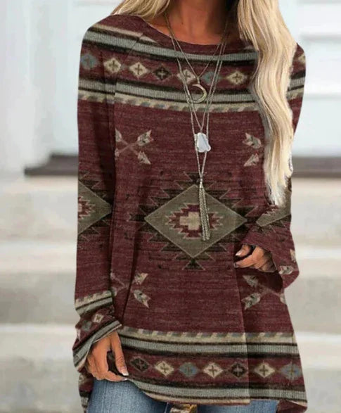 A long t-shirt dress in a retro ethnic style, featuring a round neckline and mid-waist silhouette for a flattering fit.