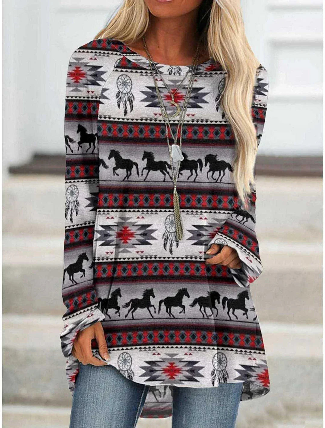 A long t-shirt dress in a retro ethnic style, featuring a round neckline and mid-waist silhouette for a flattering fit.