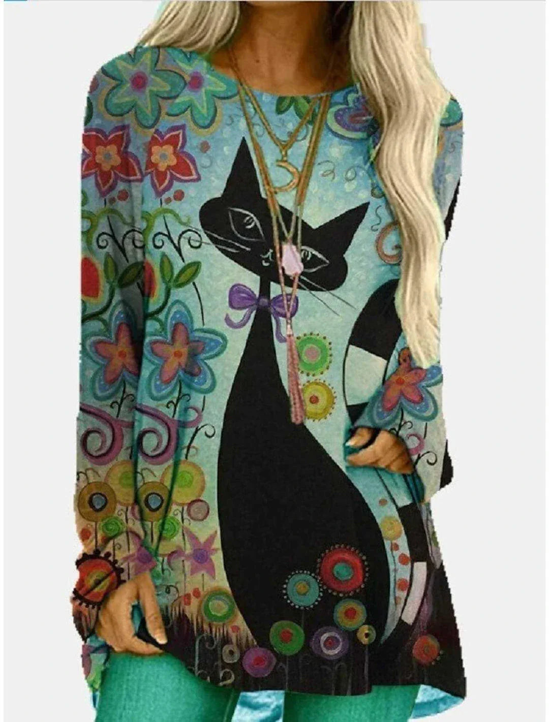 A long t-shirt dress in a retro ethnic style, featuring a round neckline and mid-waist silhouette for a flattering fit.