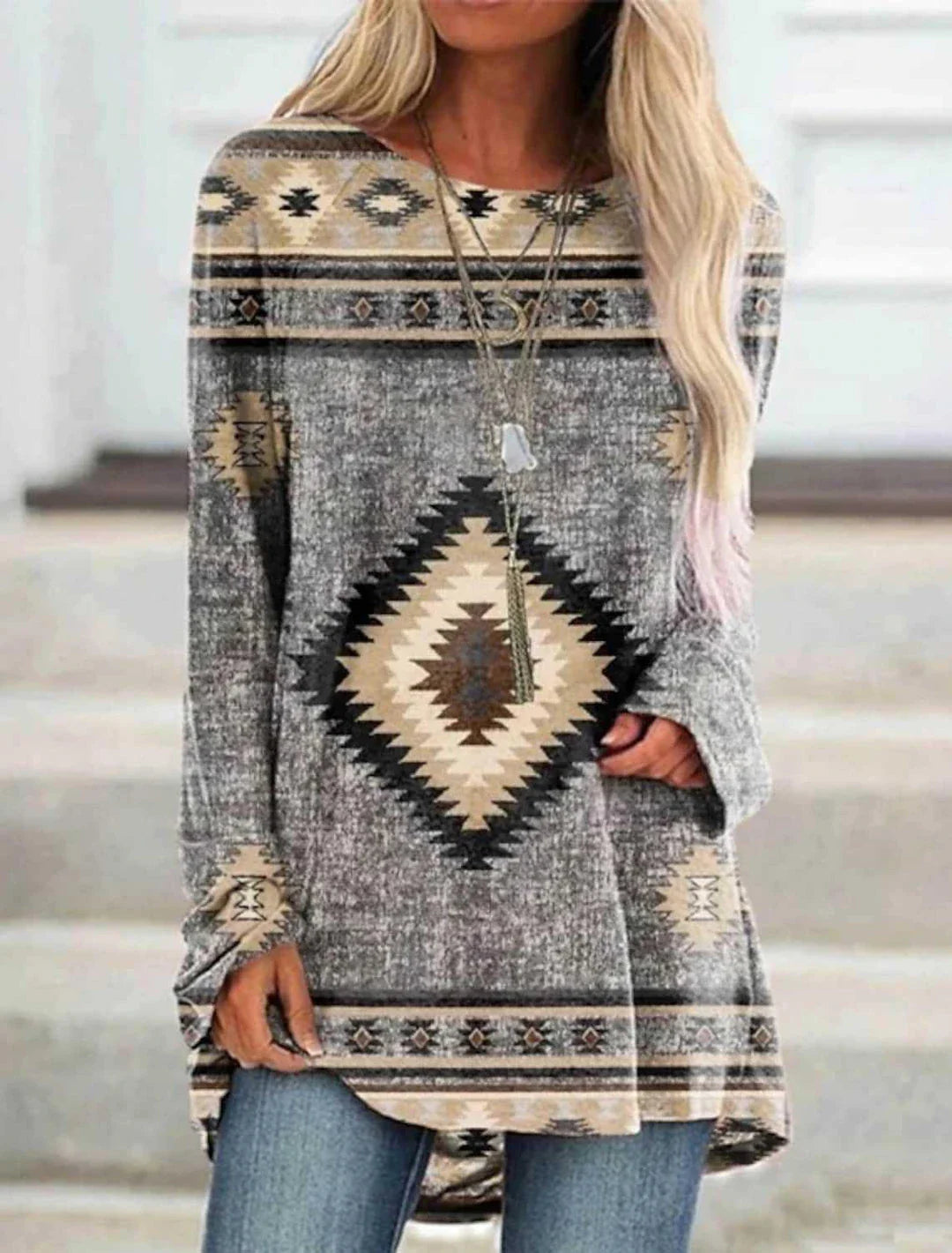 A long t-shirt dress in a retro ethnic style, featuring a round neckline and mid-waist silhouette for a flattering fit.