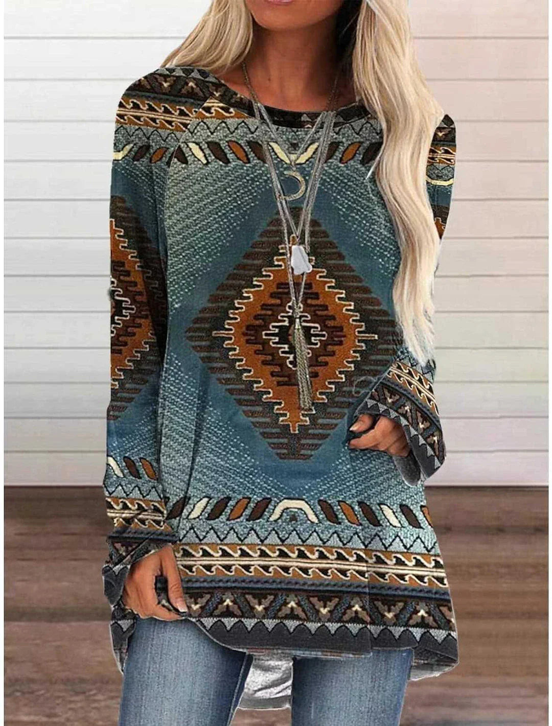 A long t-shirt dress in a retro ethnic style, featuring a round neckline and mid-waist silhouette for a flattering fit.