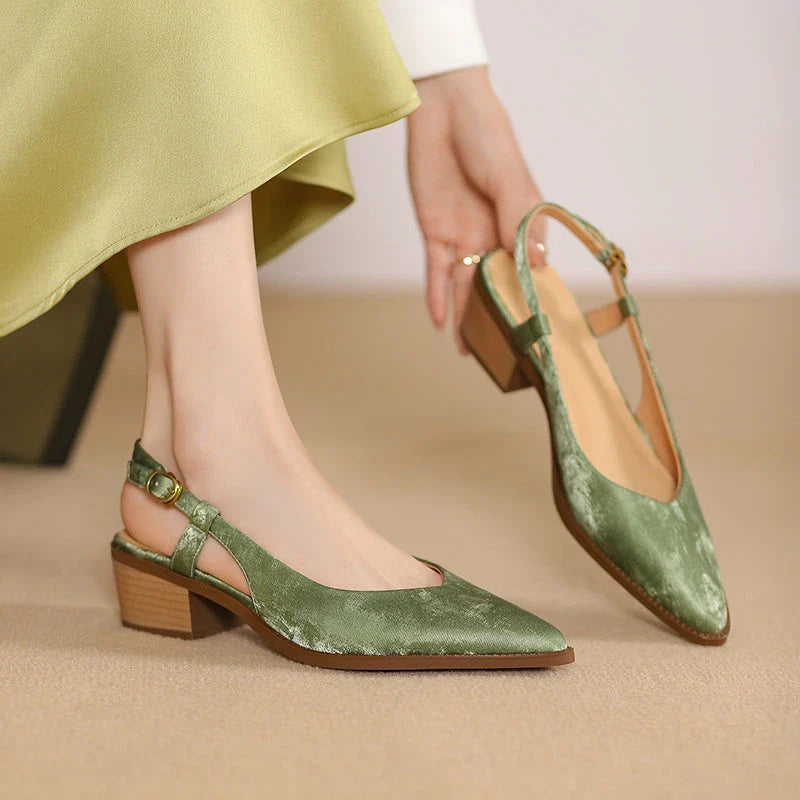 Elegant and comfortable slingback leather pumps in a stylish green colour