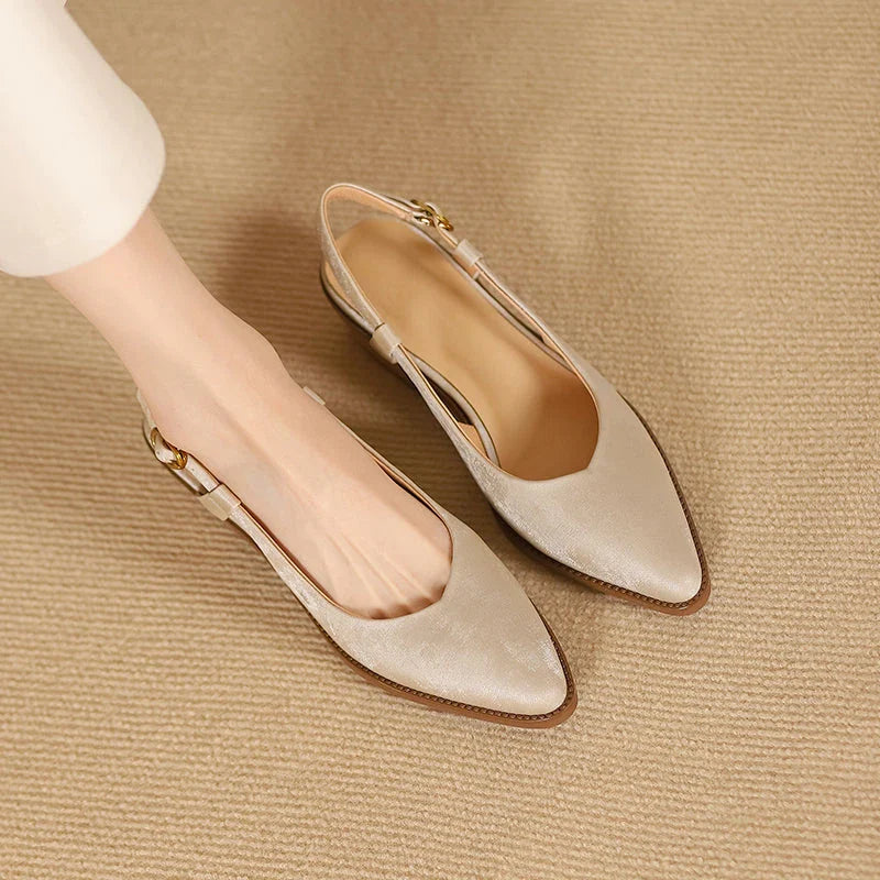 Elegant and comfortable slingback leather pumps in a stylish green colour