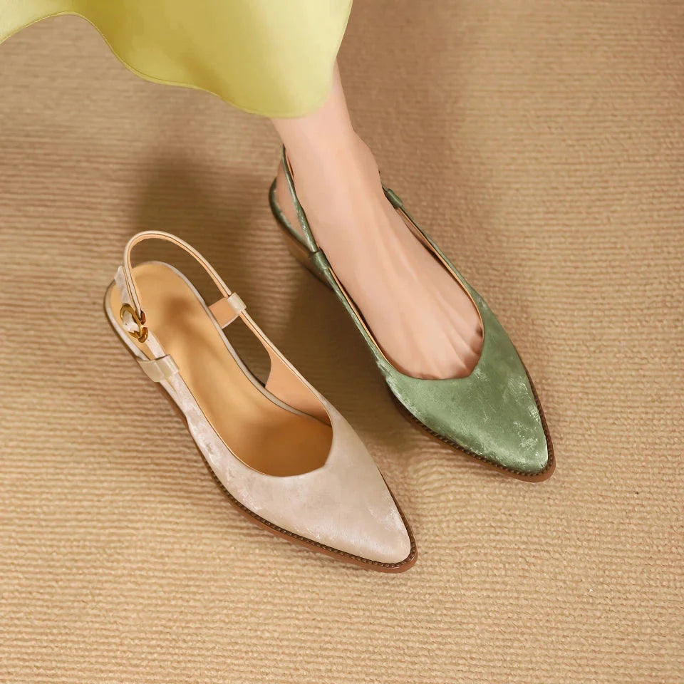 Elegant and comfortable slingback leather pumps in a stylish green colour