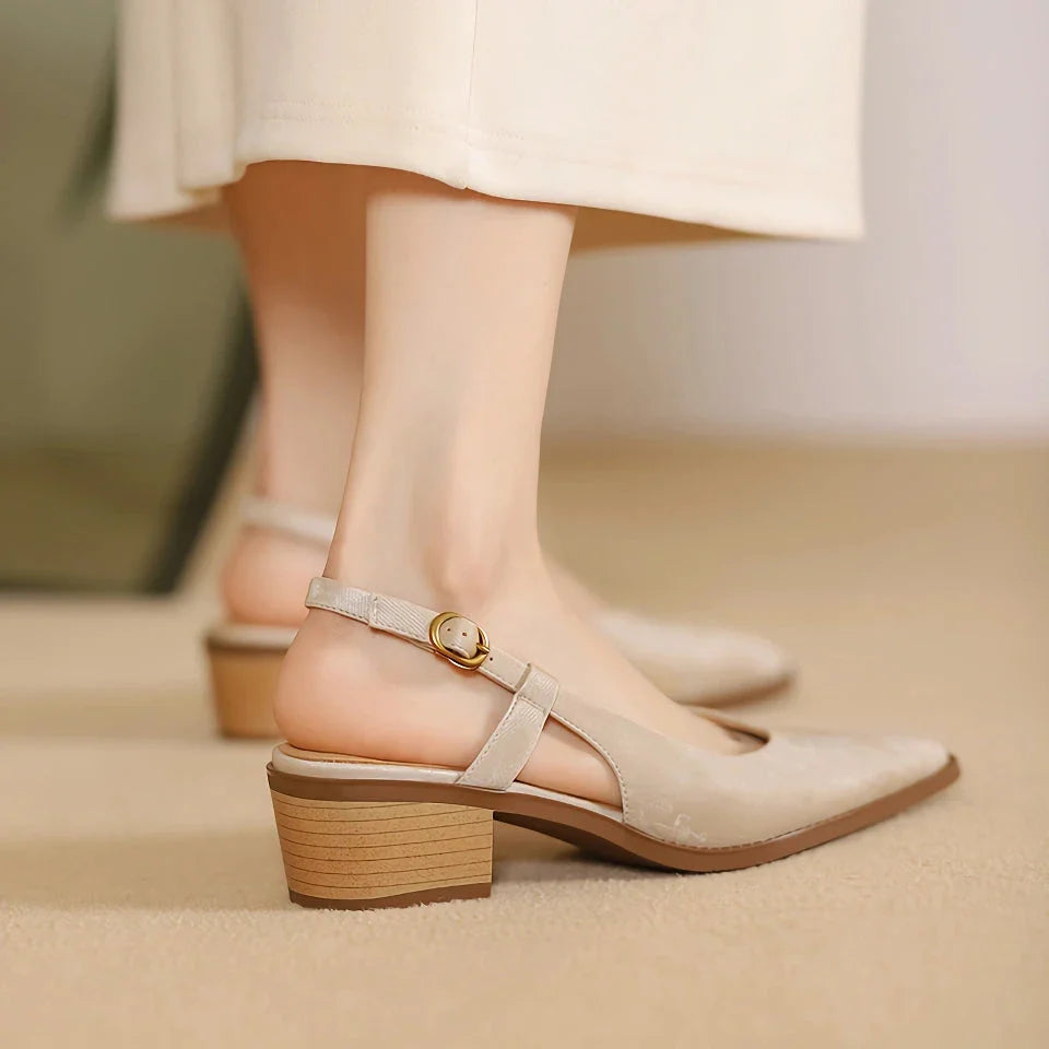 Elegant and comfortable slingback leather pumps in a stylish green colour