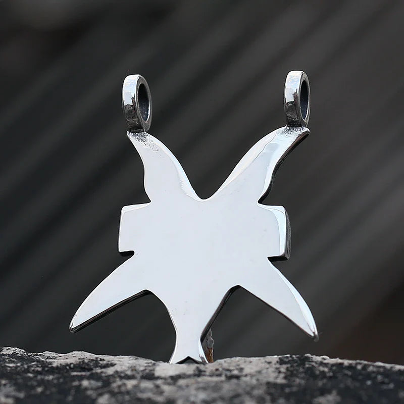 A close-up view of a three-dimensional pendant necklace made of titanium steel, showcasing its sleek and sophisticated design.
