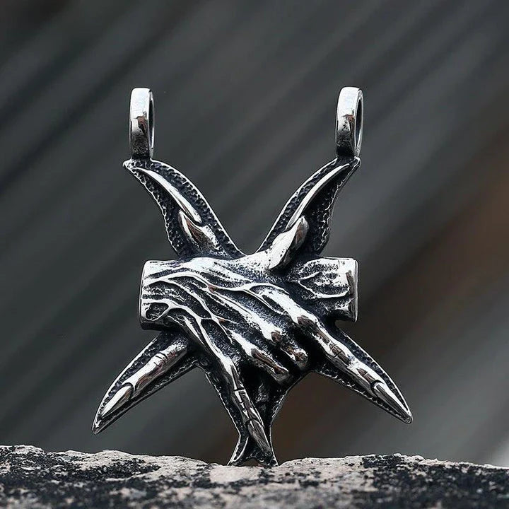 A close-up view of a three-dimensional pendant necklace made of titanium steel, showcasing its sleek and sophisticated design.